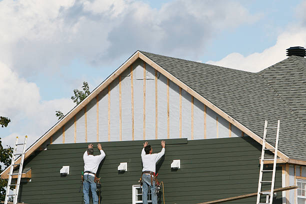 Professional Siding technician working in Richwood, OH